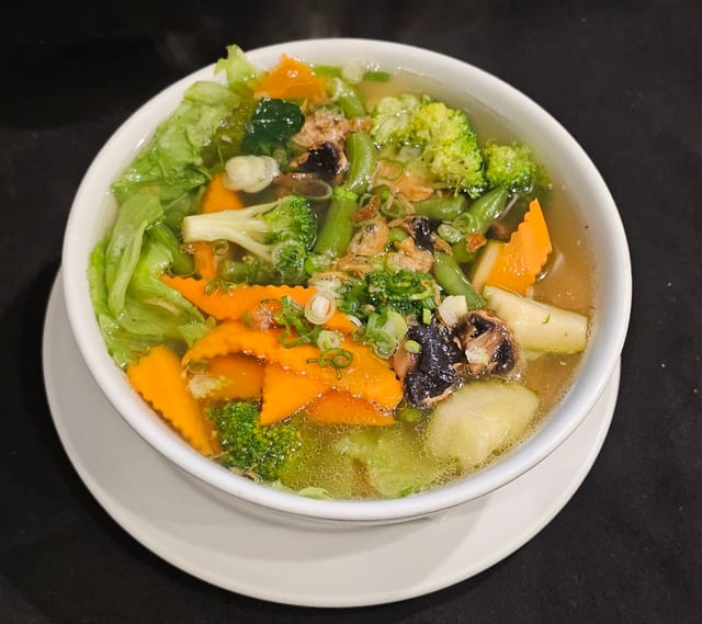 E9. Vegetable Egg Noodle Soup.